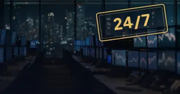 Trading screens at night, some markets open, some closed
