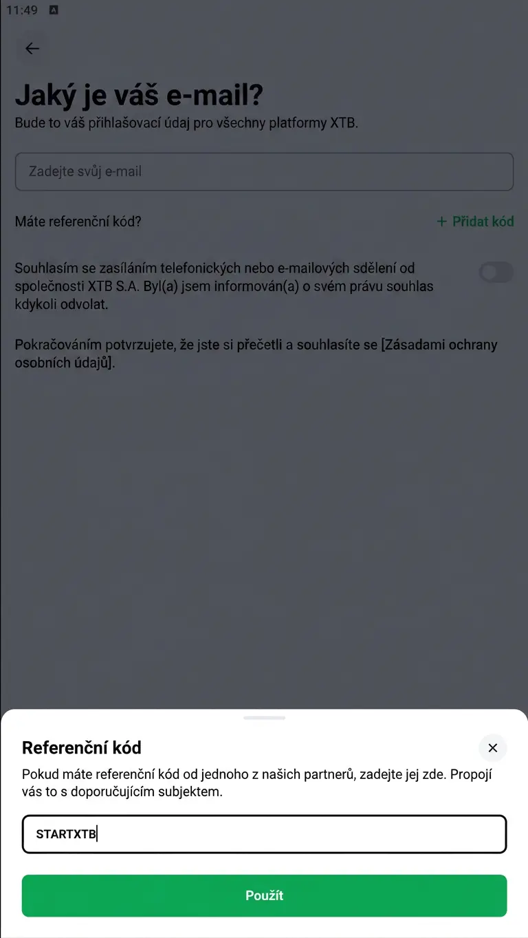 Mobilní aplikace XTB — modální panel „Referenční kód
