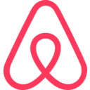 The company logo of Airbnb